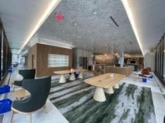 tables and chairs on the first floor of Countway Library