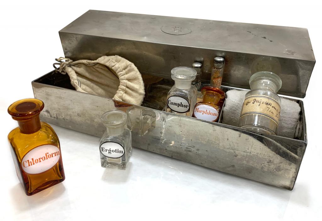 An open metal box containing anesthesia artifacts collected by Bert B. Hershenson, MD